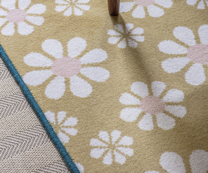 Alternative Flooring, Trend Watch Inspiration, Summer 2024, Quirky Bloom Polenta rug with Dolly Mixture Vibrant Teal edge
